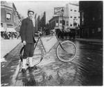 messenger boy with bike