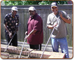 Seniors working in garden at third ward