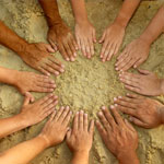 150px-photo-hands-in-sand.jpg