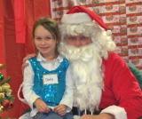 Girl with Santa.jpg