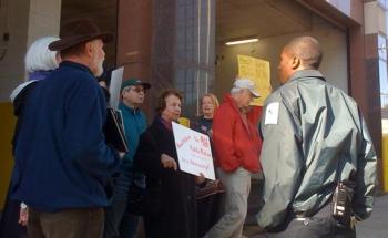 security guards harrass health protesters.jpg