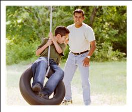 Father and son tire swing.jpg